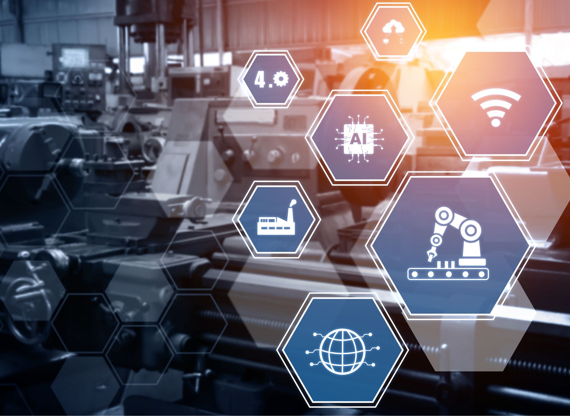 Un'industria sullo sfondo e in primo piano esagoni blu contenenti icone di innovazioni tecnologiche industriali